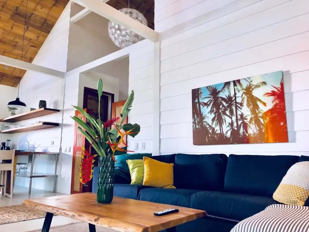 Living room with blue sofa and wooden coffee table — marAmar Luxury Apartment I